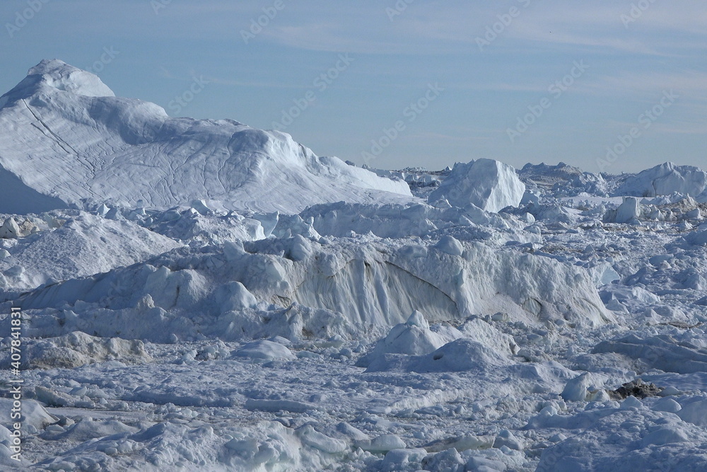 Greenland. Iceberg and ice from glacier in arctic nature. Icebergs in Ilulissat icefjord. Affected by climate change and global warming.