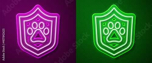 Glowing neon line Animal health insurance icon isolated on purple and green background. Pet protection concept. Dog or cat paw print. Vector.