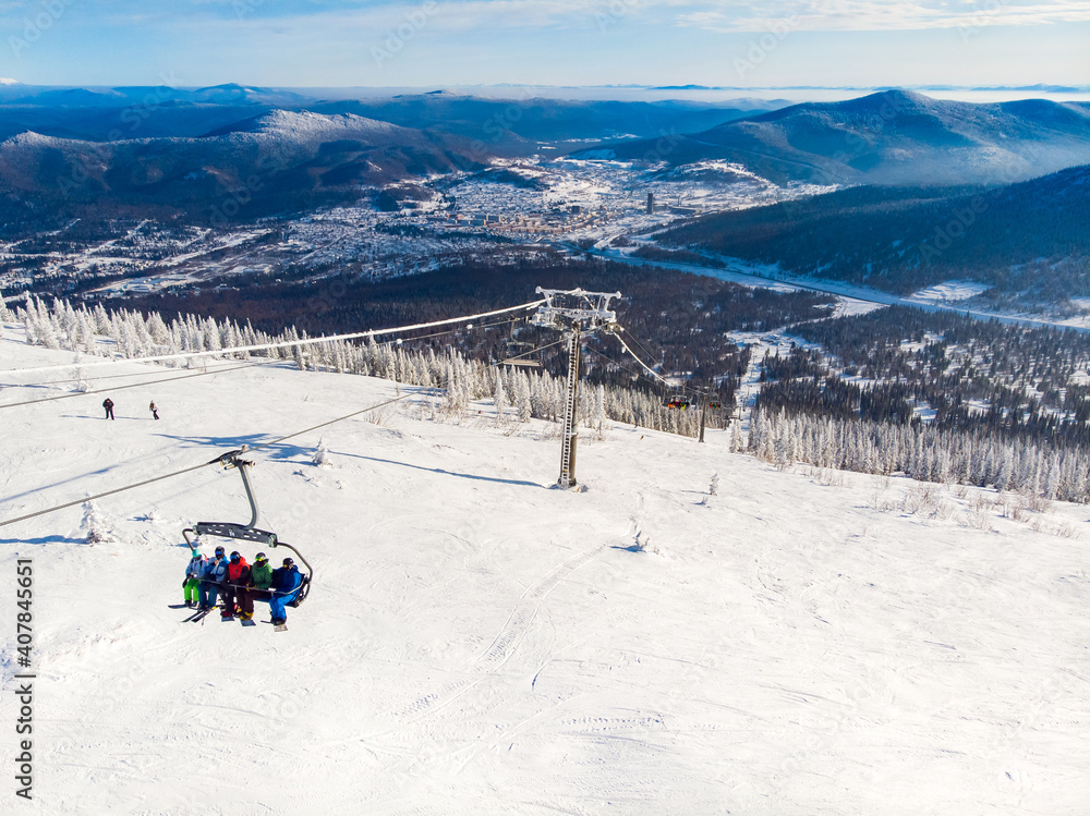 Sheregesh ski lift resort in winter, landscape on mountain and hotels, aerial top view Kemerovo region Russia Sheregesh ski lift resort in winter, landscape on mountain and hotels, aerial top view Kemerovo region Russia