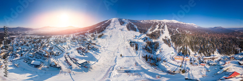 Panorama Sheregesh ski resort in winter, landscape on mountain and hotels, aerial top view Kemerovo region Russia