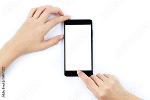 Female hand holding black smartphone with blank screen isolated on white background.