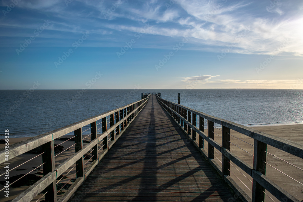 Fototapeta premium Vendée, France; January 15, 2021: The Noirmoutier island pier on a clear day.