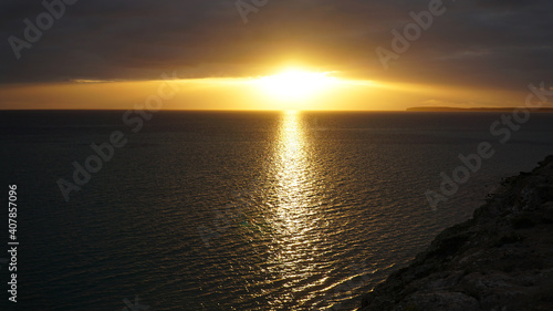 Sunset over the ocean at Shark Bay between Exmouth and Perth in Western Australia.