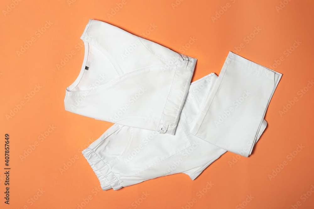 Photo of folded clothes for medical workers, clothes for nurses and pediatricians, stylized photo for Instagram or catalog. Comfortable and stylish clothes of modern doctors Photo of folded clothes for medical workers, clothes for nurses and pediatricians, stylized photo for Instagram or catalog. Comfortable and stylish clothes of modern doctors