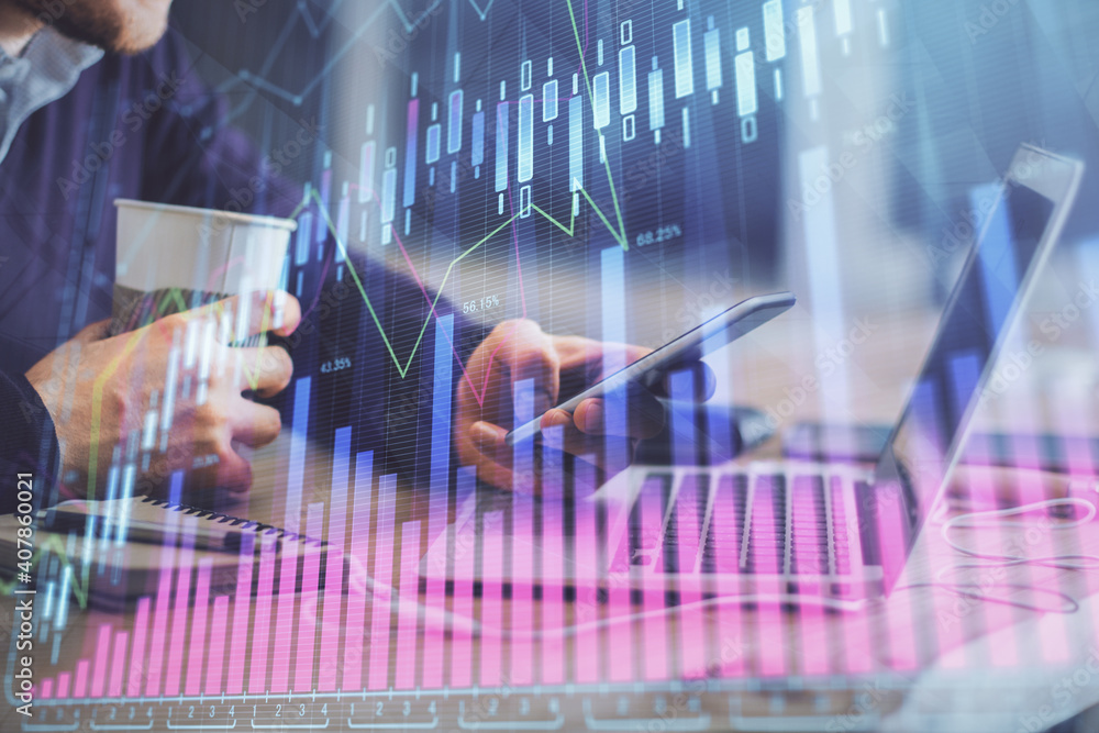 Double exposure of man's hands holding and using a phone and financial graph drawing. Analysis concept. Double exposure of man's hands holding and using a phone and financial graph drawing. Analysis concept.