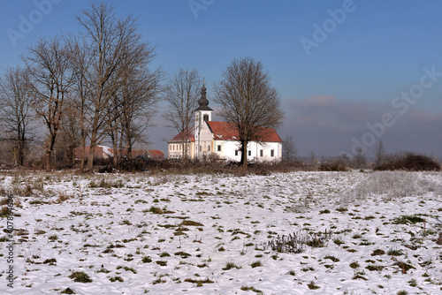 The Catholic Church in the field in Kamensko, Croatia photo