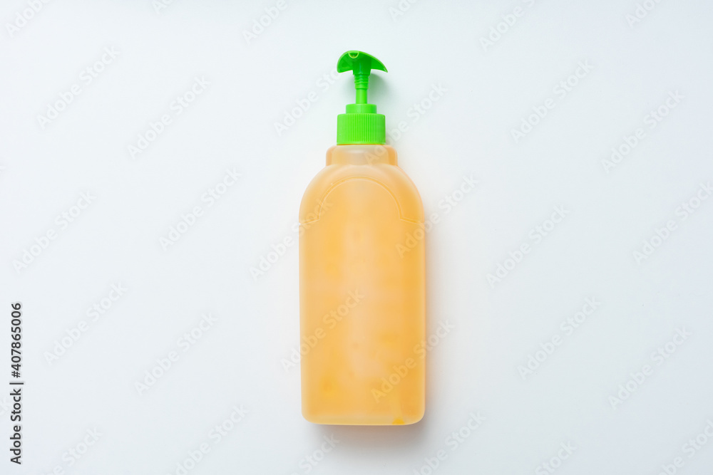 Bottle of gel or liquid soap dispenser with plastic pump, white background, copy space Bottle of gel or liquid soap dispenser with plastic pump, white background, copy space