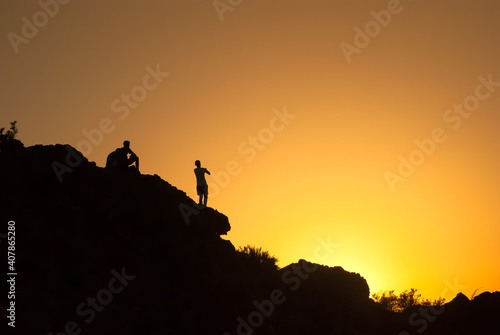 group of boys capture the sunset