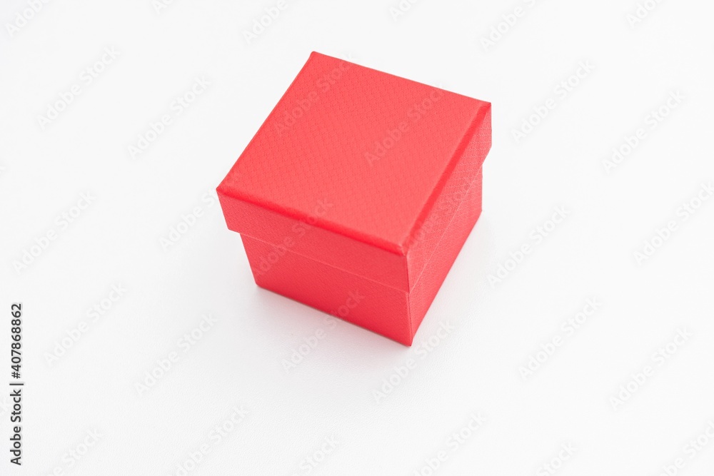 Red cardboard box, white background, copy space Red cardboard box, white background, copy space