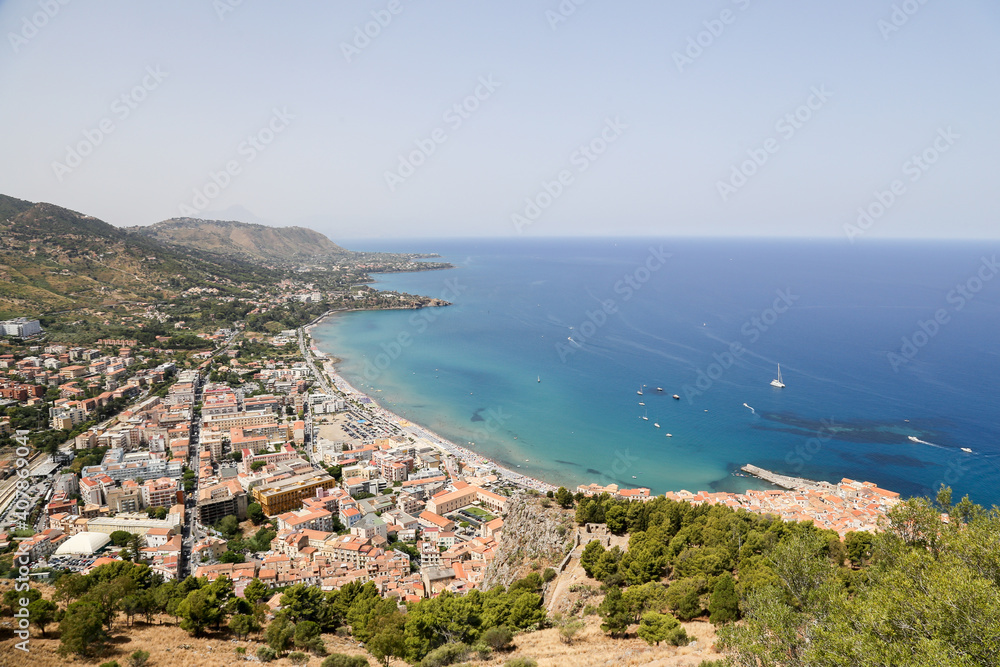 Panoramic view of the beach. Cote d'Azur, ships at sea, small coastal town