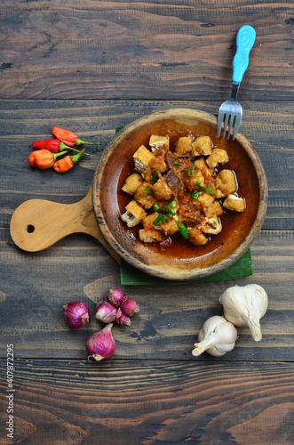 tahu gejrot or gejrot tofu, traditional food from west java indonesia photo