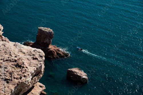 boat sea and rocks