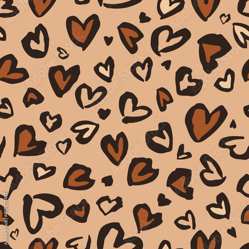 Valentine Leopard or cheetah seamless pattern. Trendy animal print. Spotted hearts imitate jaguar skin. Vector background for fabric, textile, wallpaper, wrapping paper, etc