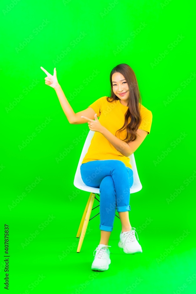 Portrait beautiful young asian woman smile with action Portrait beautiful young asian woman smile with action