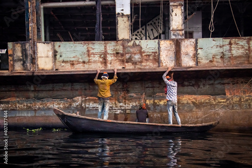 Ship repairing on the river photo