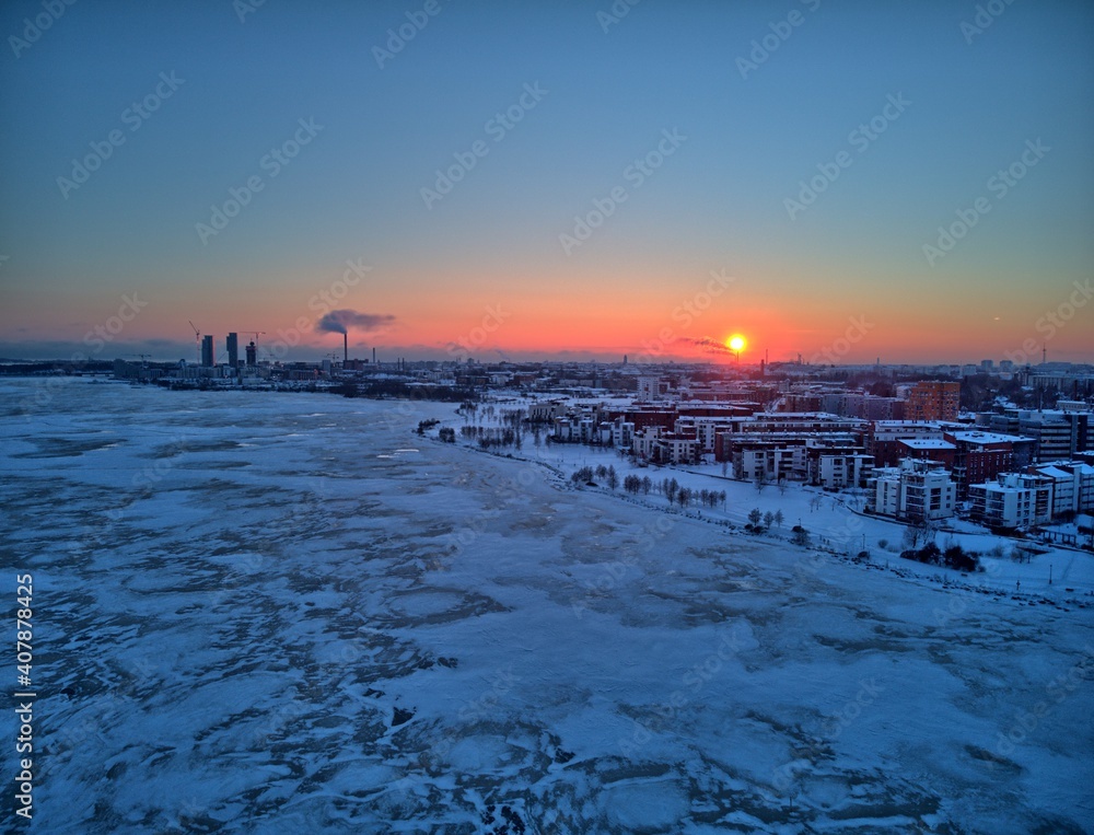Drone sunset over winter city