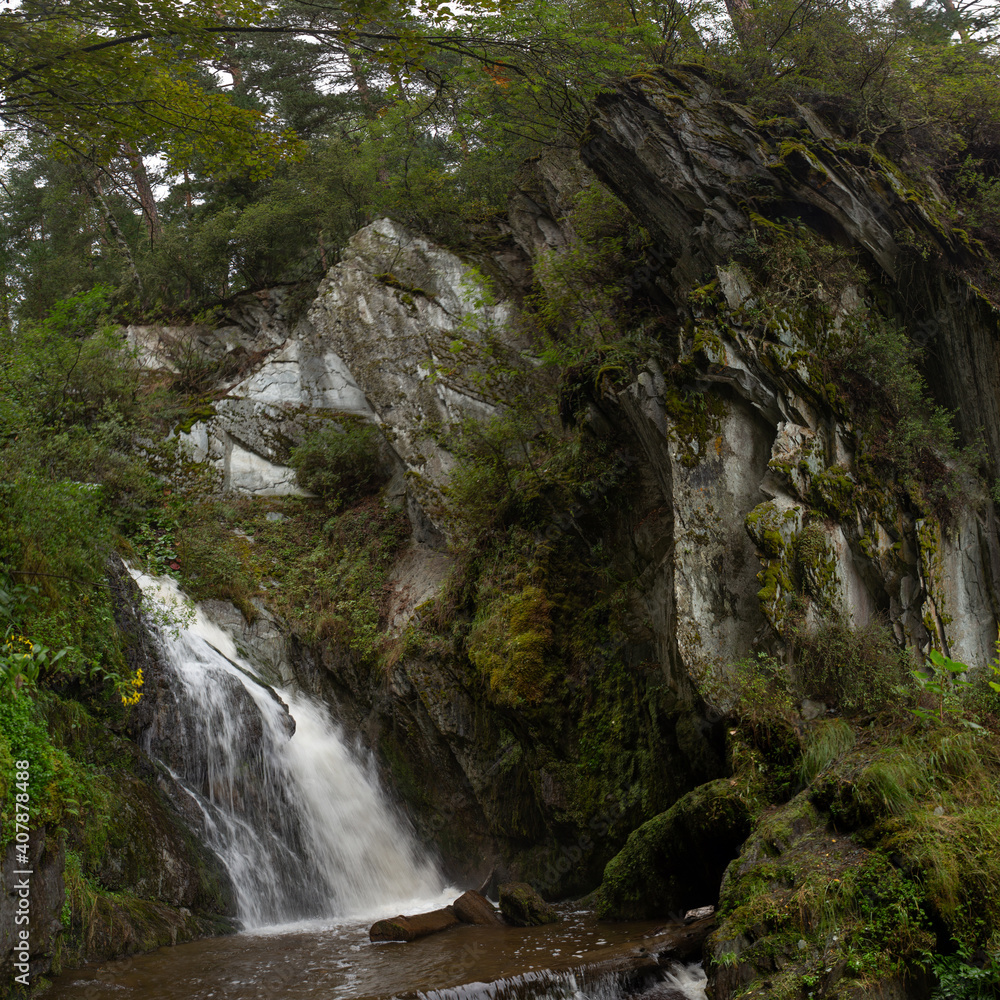 waterfall in the mountains waterfall in the mountains