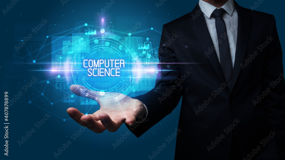 Man hand holding COMPUTER SCIENCE inscription, technology concept Man hand holding COMPUTER SCIENCE inscription, technology concept