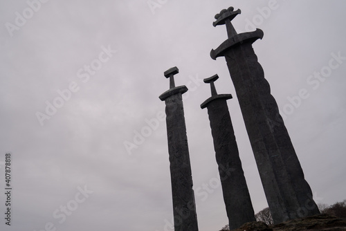 Low angle shot of the three swords of the Sverd i fjell in the Hafrsfjord neighborhood of Madla photo