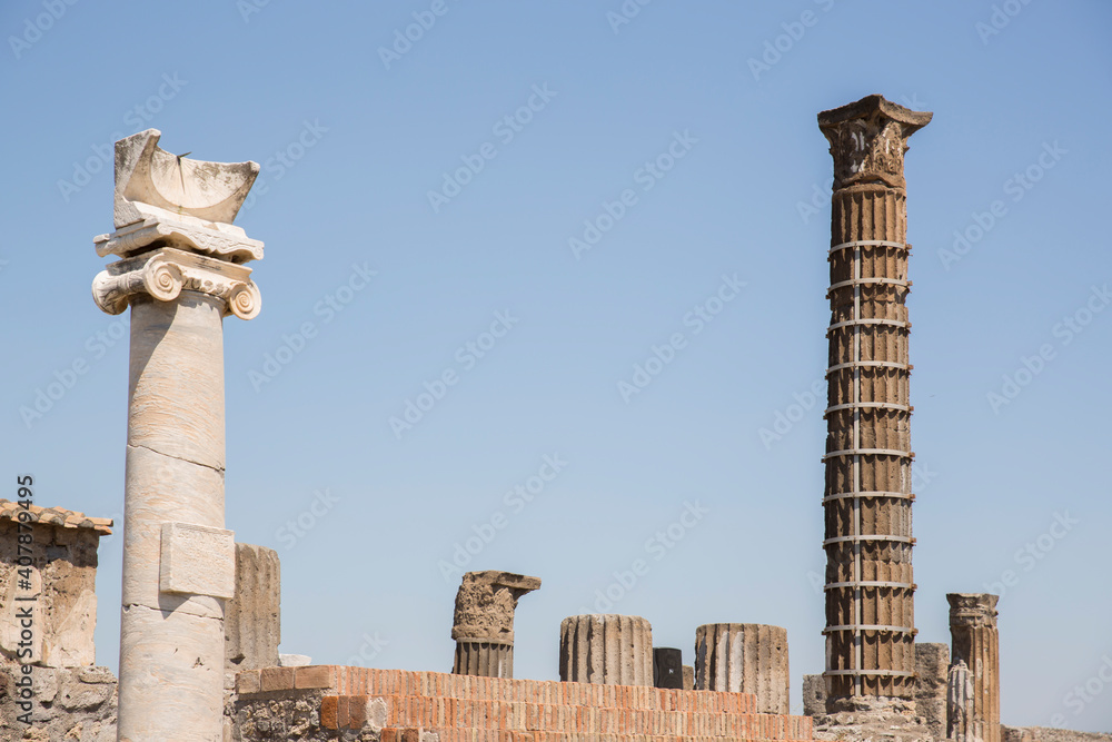 View of the columns in the foro of Pompeii's remains, the ancient Roman city.