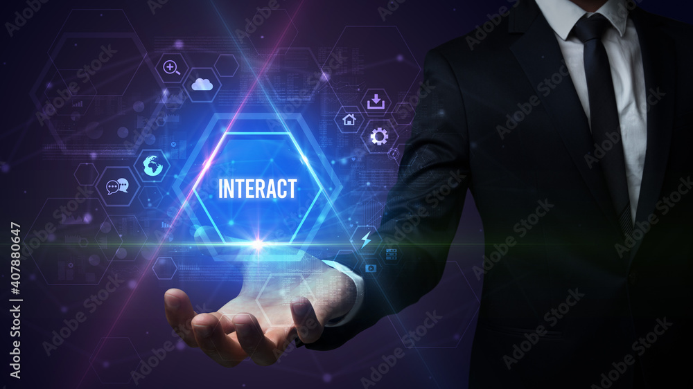 Man hand holding INTERACT inscription, social media concept Man hand holding INTERACT inscription, social media concept
