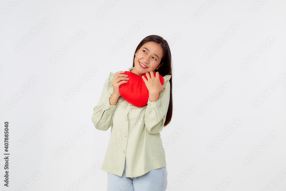 young attractive woman holding a red heart young attractive woman holding a red heart