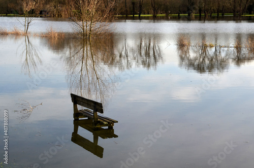 The public bench and the swollen river. © Didier San Martin