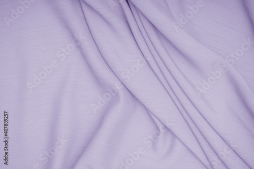 Purple fabric waves texture background.