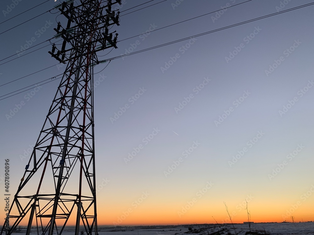 High voltage tower at sunset 