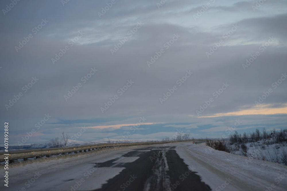 dawn on a winter road with clouds dawn on a winter road with clouds