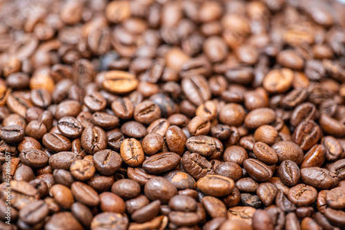 coffee beans close-up, foreground and background blurred, focus on middle