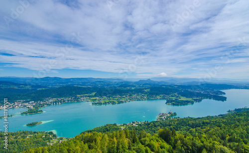 Aerial view of the alpine lake Worthersee, famous tourist attraction for many water activity in Klagenfurt, Carinthia, Austria.