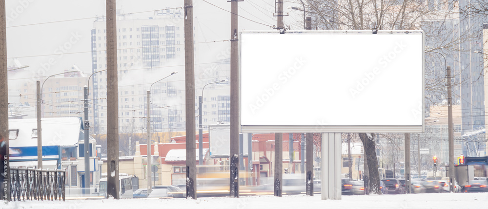 billboard in winter .MOCKUP with white advertising space near the road - obrazy, fototapety, plakaty 