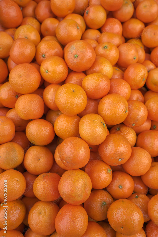 Background of fresh juicy clementine mandarins Background of fresh juicy clementine mandarins