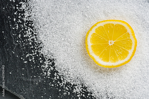 citric acid on a dark stone background