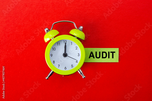 Time for audit, concept. Finance clock