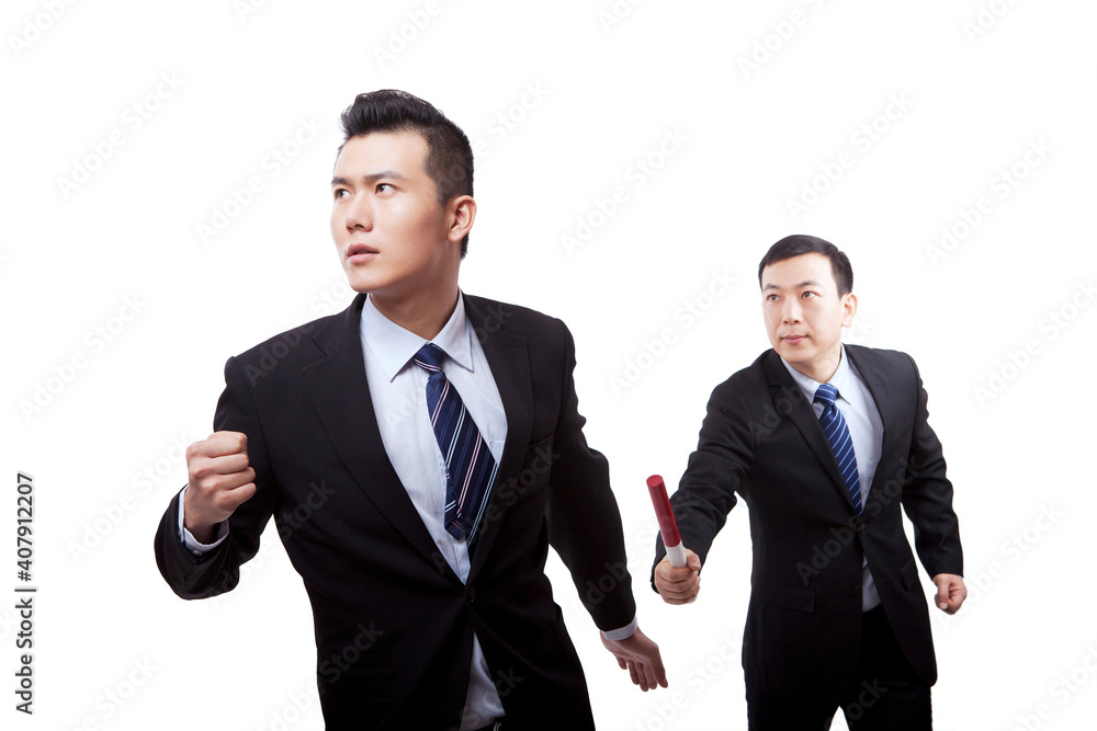 Business people in passing the baton