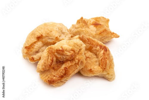 Fresh puff pastries, isolated on white background