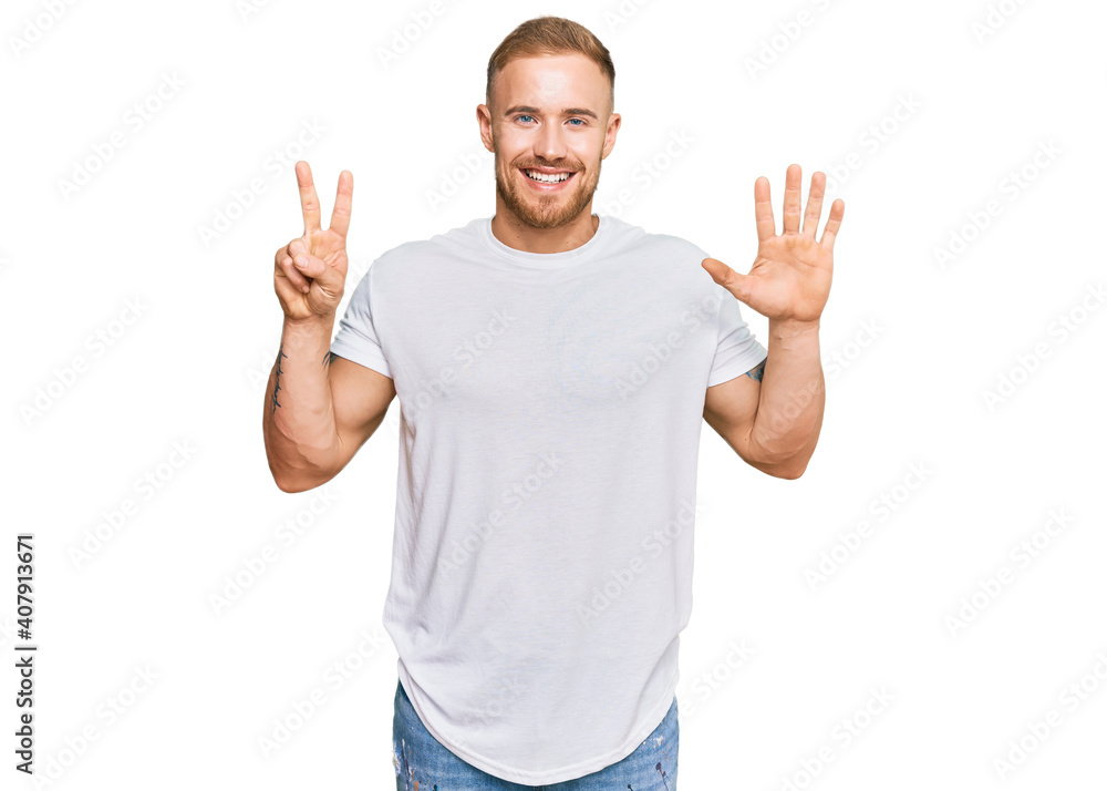 Young irish man wearing casual clothes showing and pointing up with fingers number seven while smiling confident and happy. Young irish man wearing casual clothes showing and pointing up with fingers number seven while smiling confident and happy.