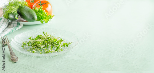 Microgreens on plate, healthy vegan raw food diet concept