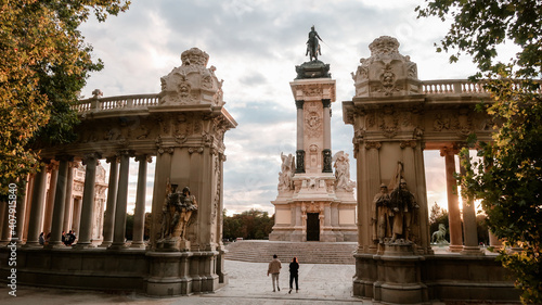 Alfonso XII monument at El Retiro Park at sunset in Madrid Spain photo