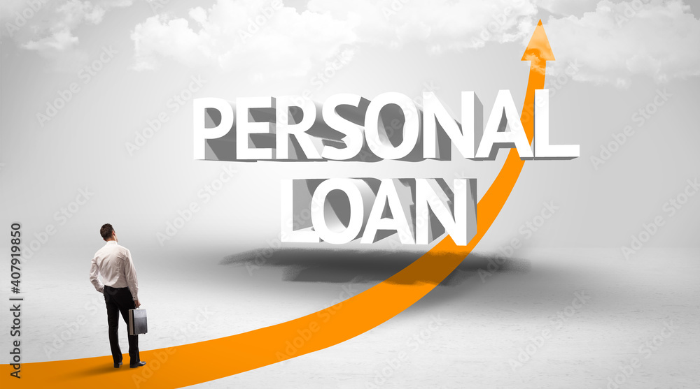 Rear view of a businessman standing in front of PERSONAL LOAN inscription, successful business concept Rear view of a businessman standing in front of PERSONAL LOAN inscription, successful business concept