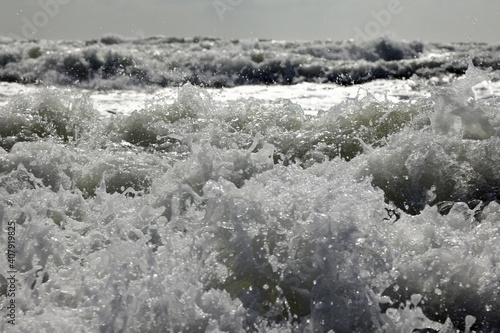 Bubbles of the water caused by waves © Bohdan