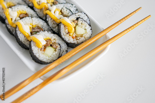 Sushi Makis in white background (copy space)