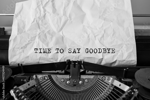 Text Time to Say Goodbye typed on retro typewriter photo