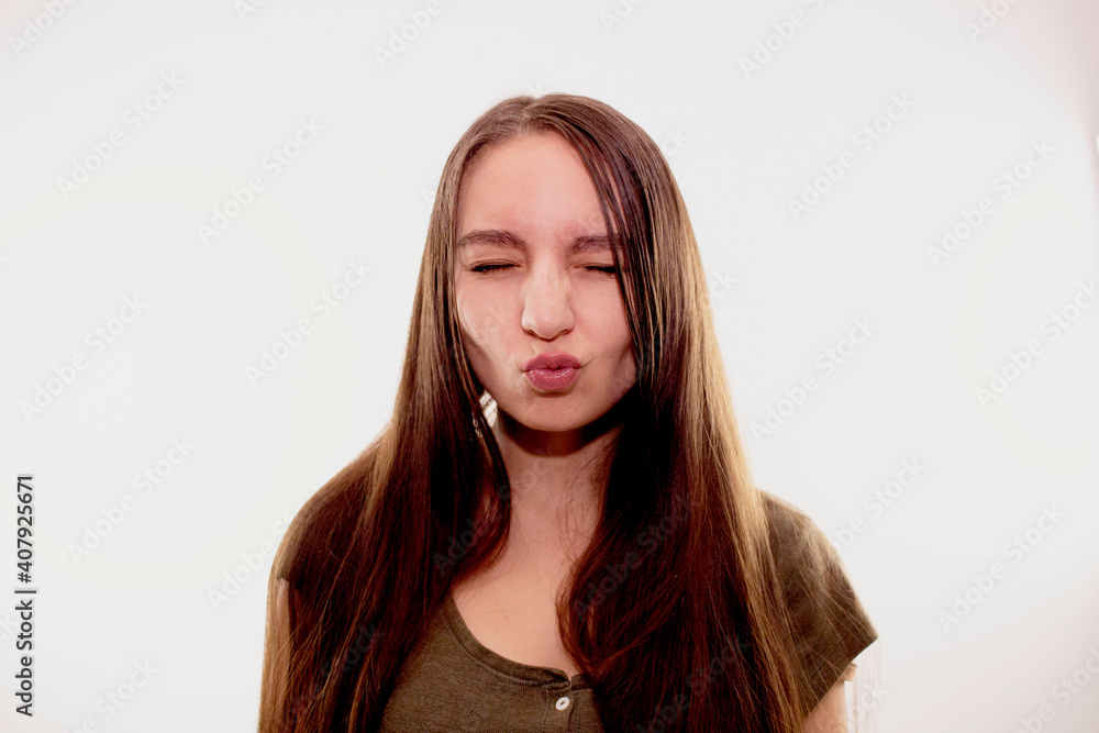 young woman face expressions in the studio young woman face expressions in the studio