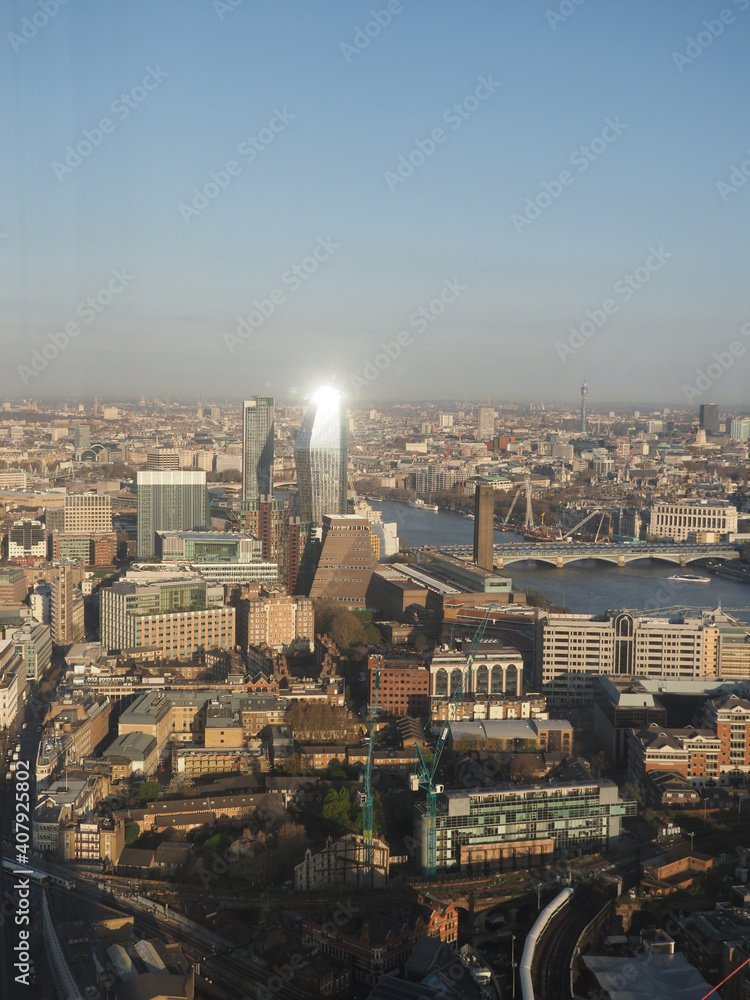 aerial view of London city skyline and river Thames looking down from the Shard at sunrise