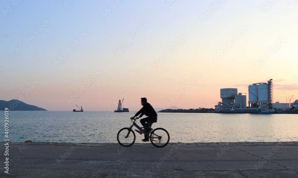 Fototapeta premium person riding a bike