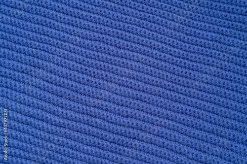 Blue knitted pattern background photo