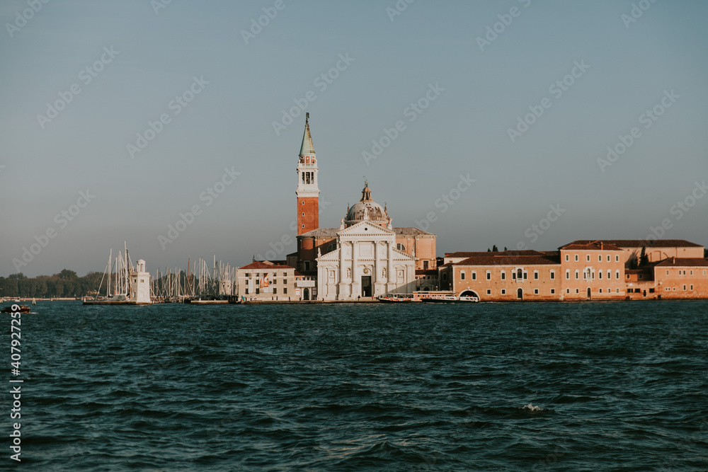 Panoramic view of the San Giorgio Maggiore island, the church and monastery at San Giorgio Maggiore in the lagoon in Venice, Italy.